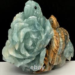 Natural quartz crystal cluster mineral specimen. Blue calcite. Hand-carved. Parrot