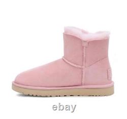 New NIB Ugg Crystal Mini Bailey Button Bling Womens Pink Suede & Sheepskin Boots