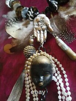 Shuar tribal ethnic jewelry primitive necklace feather head tsantsa ecuador doll