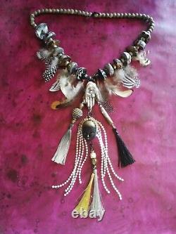 Shuar tribal ethnic jewelry primitive necklace feather head tsantsa ecuador doll
